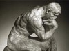 (reprodução de O Pensador, de Rodin)