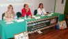 Diretora-presidenta Maria Olívia Simão, ao centro, palestrando durante abertura do evento. (Foto: Denison Silvan).